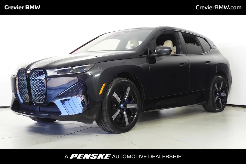 Used 2024 Black BMW xDrive50 image 1