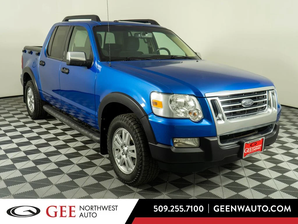 Used 2010 Blue Ford XLT image 1