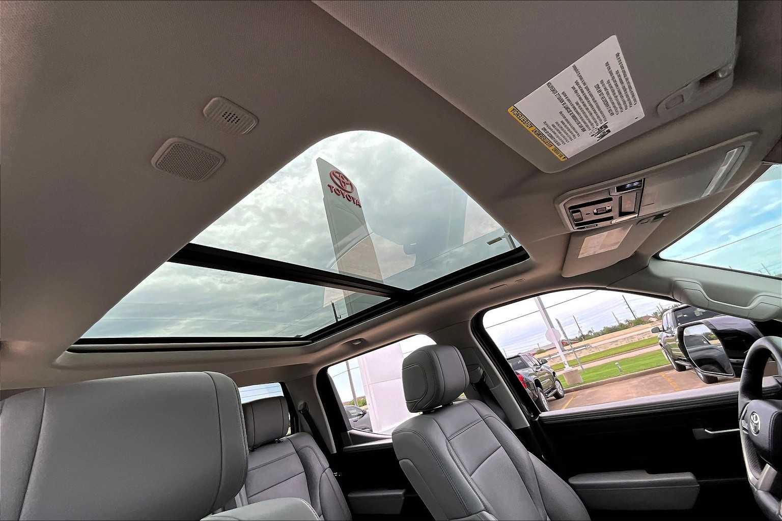 Used 2023 Magnetic Gray Metallic Toyota Limited Hybrid image 14