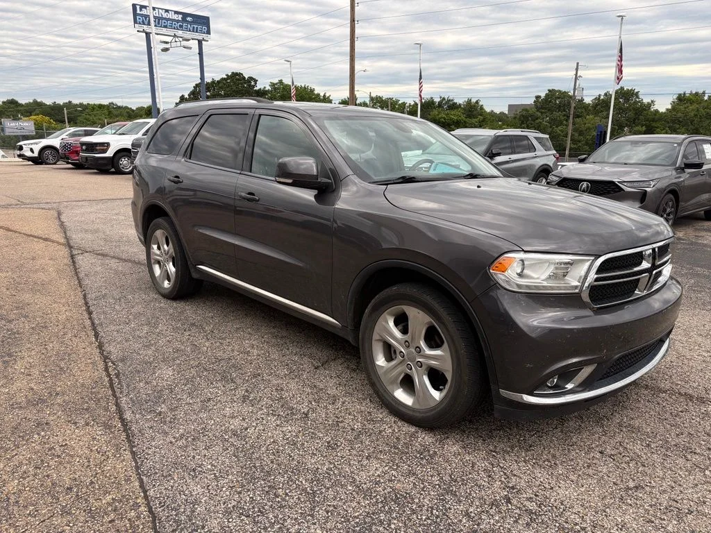 Used 2014 Crystal Metallic Dodge Limited image 1