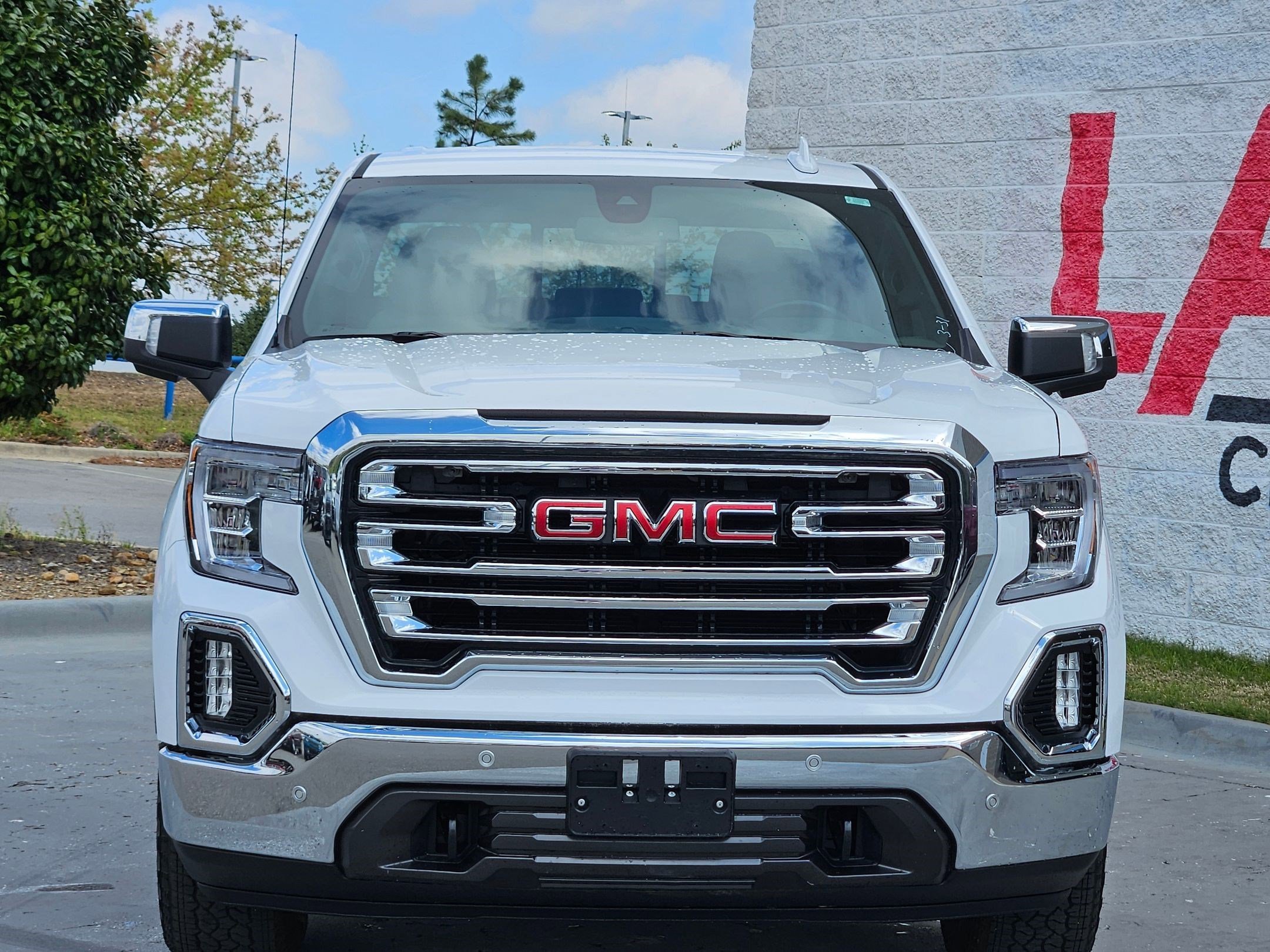 Used 2020 GMC Sierra 1500 SLT with VIN 3GTU9DEL6LG298216 for sale in Little Rock