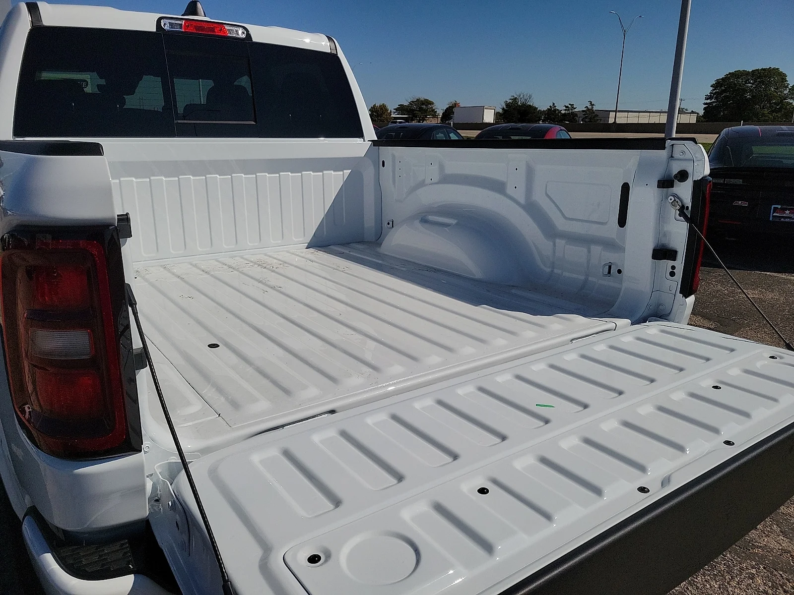 New 2027 Bright White Ram LONE STAR CREW CAB 4X4 5
