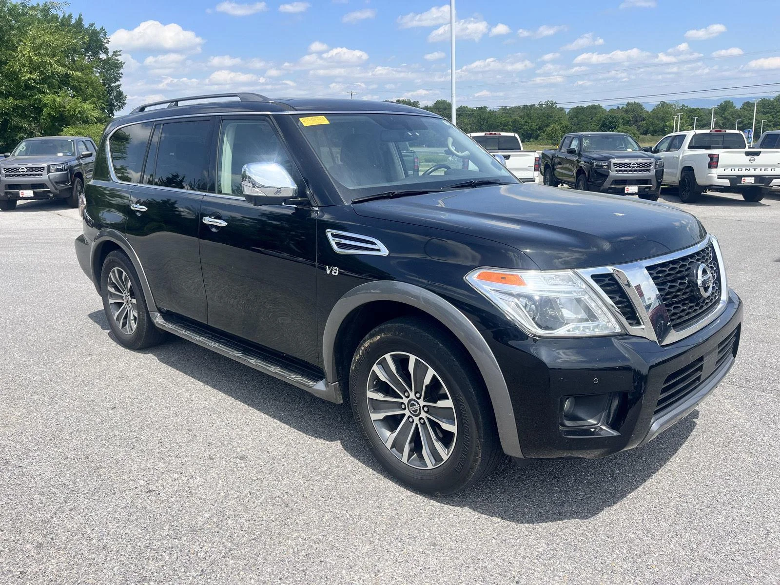 Used 2019 Super Black Nissan SL image 1