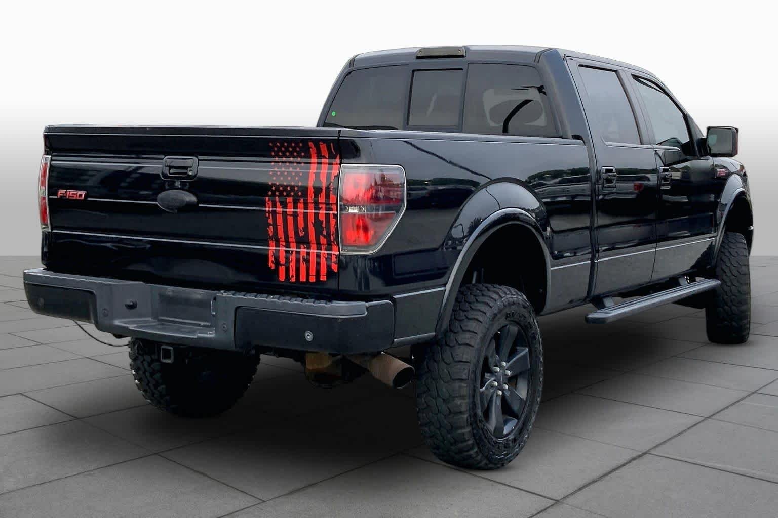 Used 2013 Tuxedo Black Metallic Ford FX4 image 12