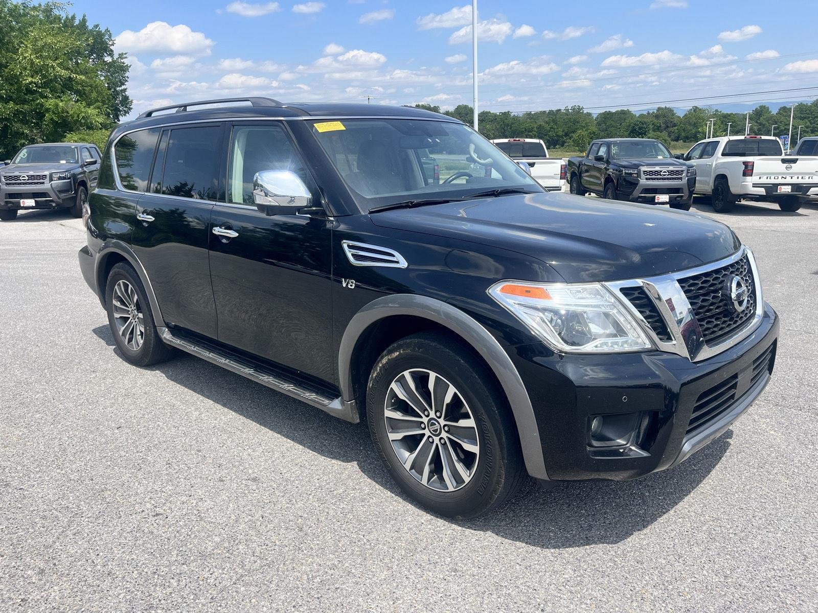 Used 2019 Super Black Nissan SL image 1