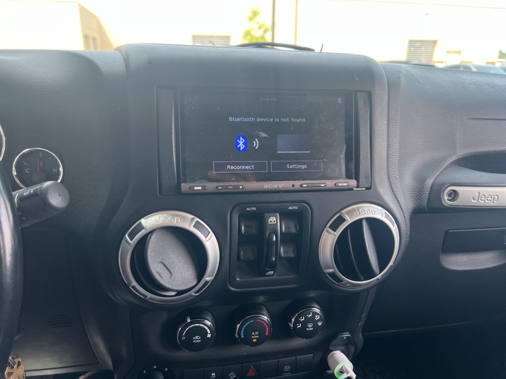 Used 2018 Black Clearcoat Jeep Sahara image 6