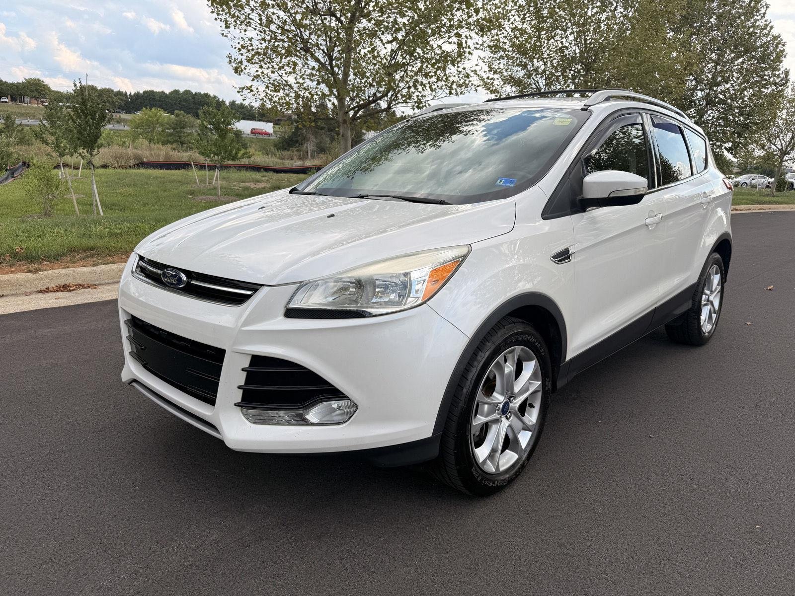 Used 2016 White Platinum Metallic Tri-Coat Ford Titanium image 2