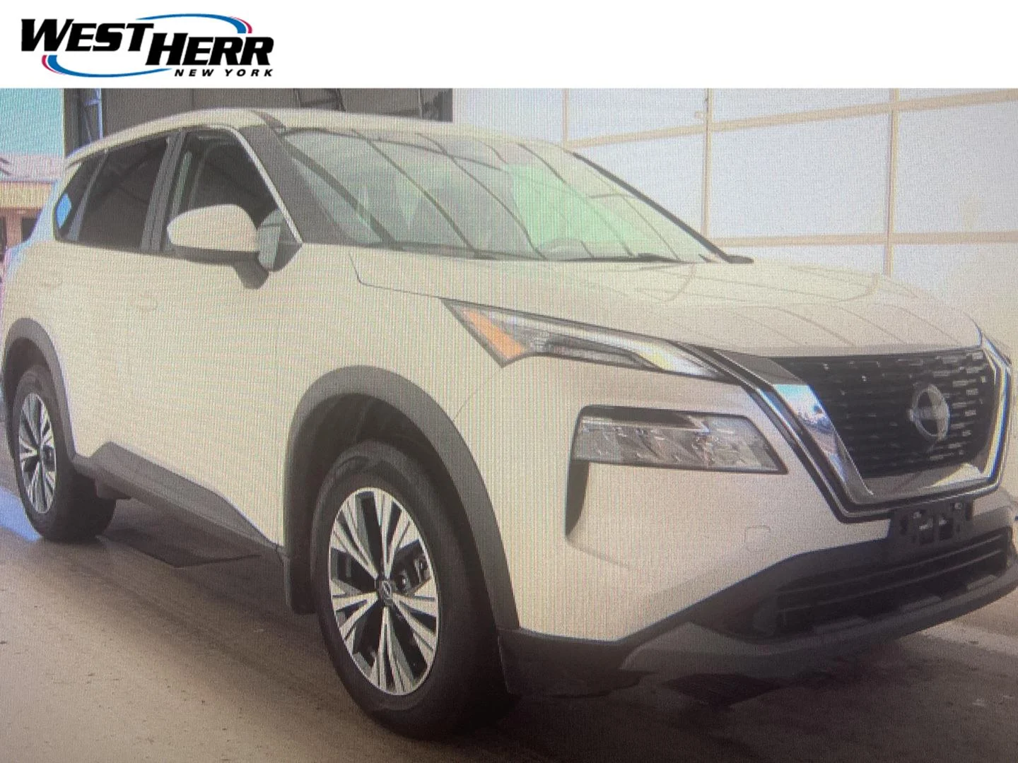 Used 2023 Pearl White Tricoat Nissan SV image 1