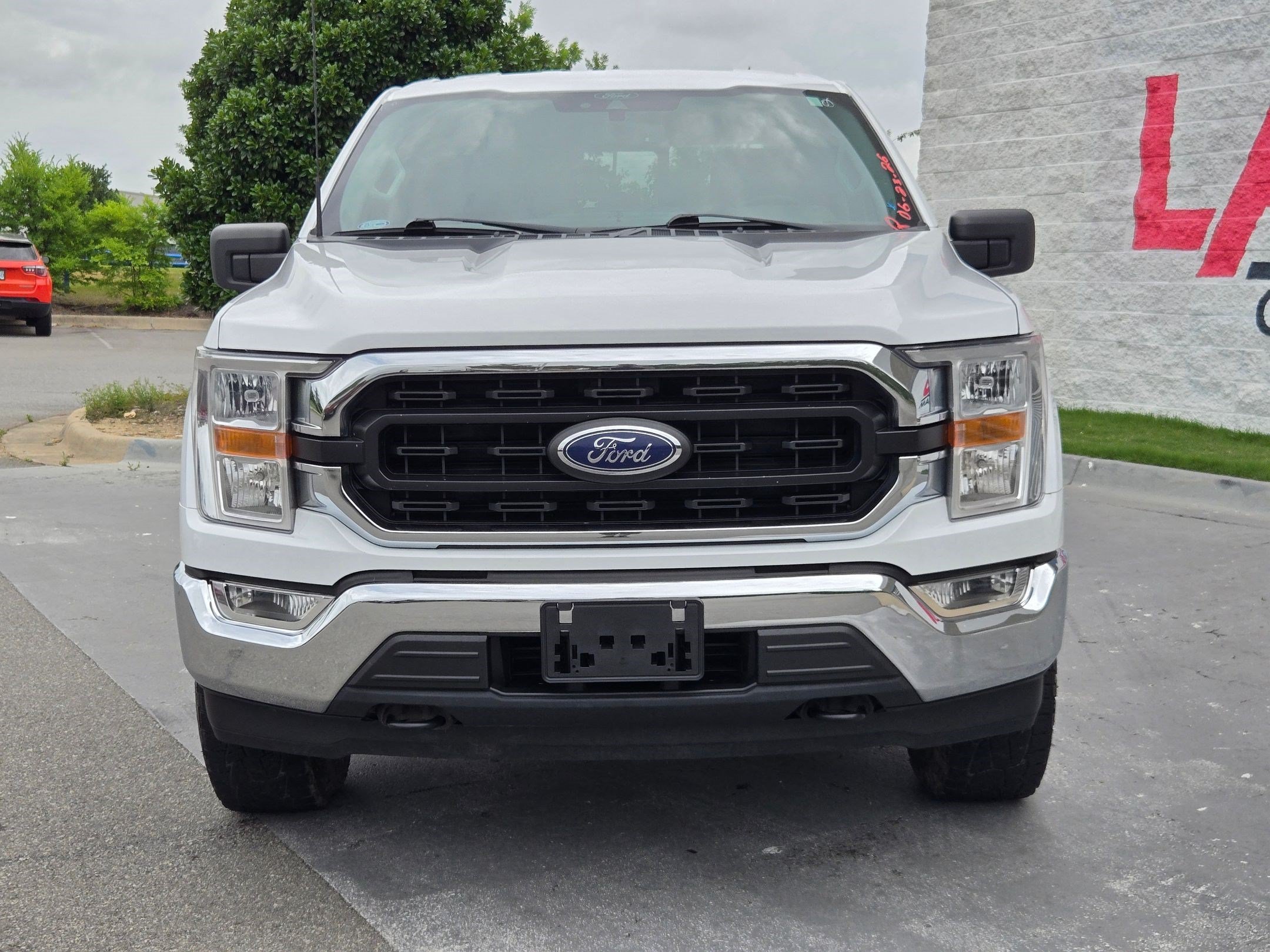 Used 2022 Ford F-150 XLT with VIN 1FTFW1E81NKD25054 for sale in Little Rock