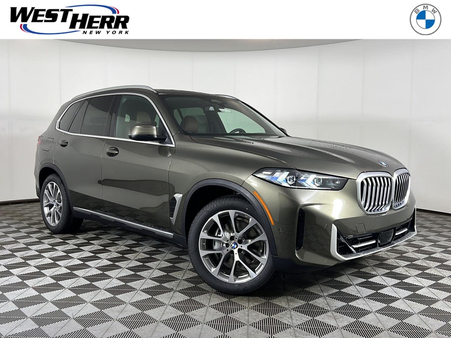 New 2026 Manhattan Green Metallic BMW xDrive40i image 1