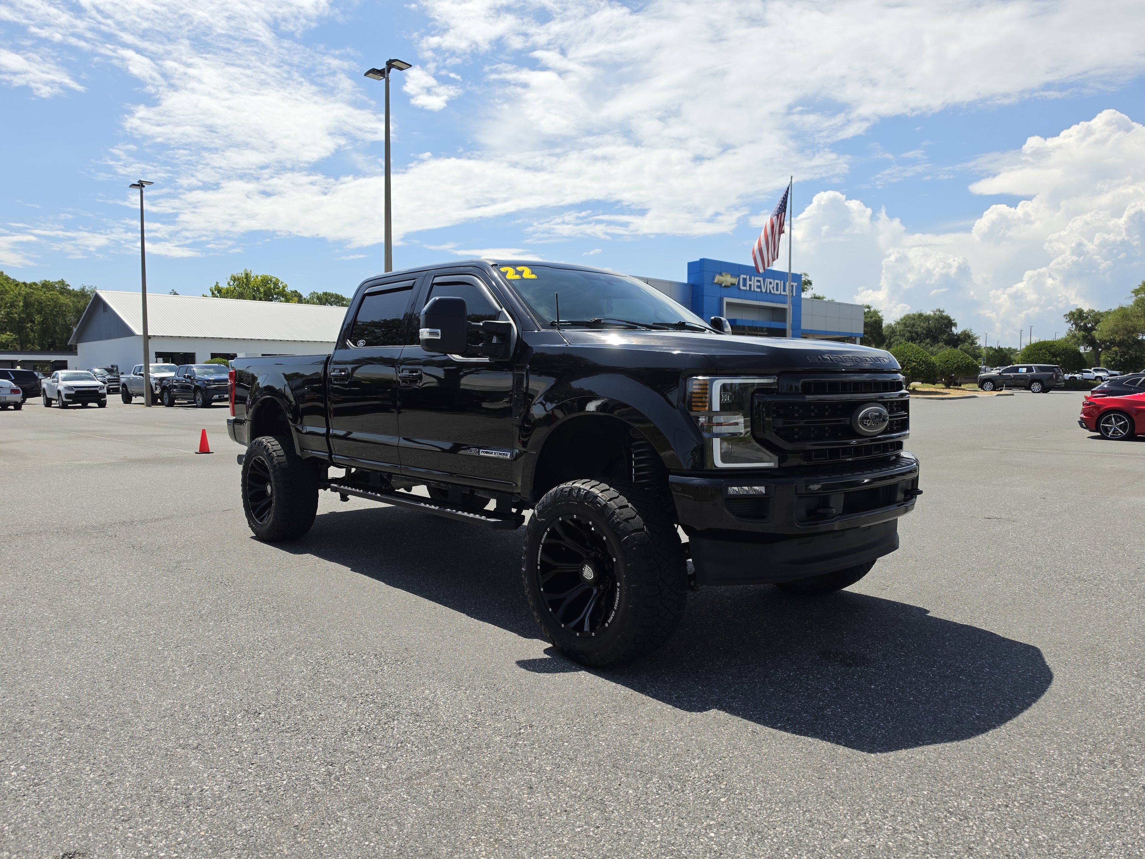 Used 2022 Black Metallic Ford LARIAT image 1