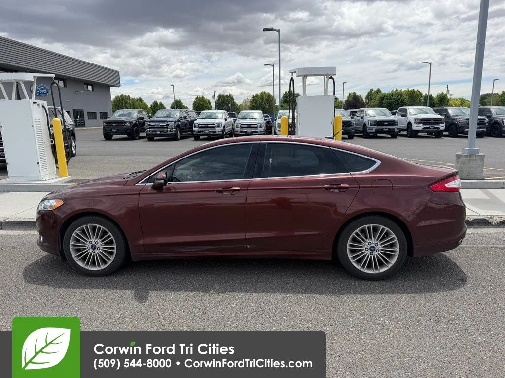 Used 2015 Bronze Fire Metallic Tinted Clearcoat Ford SE image 9