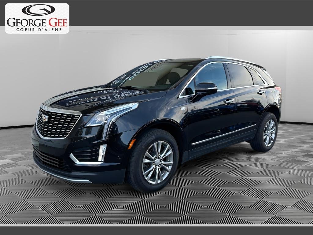 Used 2022 Stellar Black Metallic Cadillac AWD Premium Luxury image 1