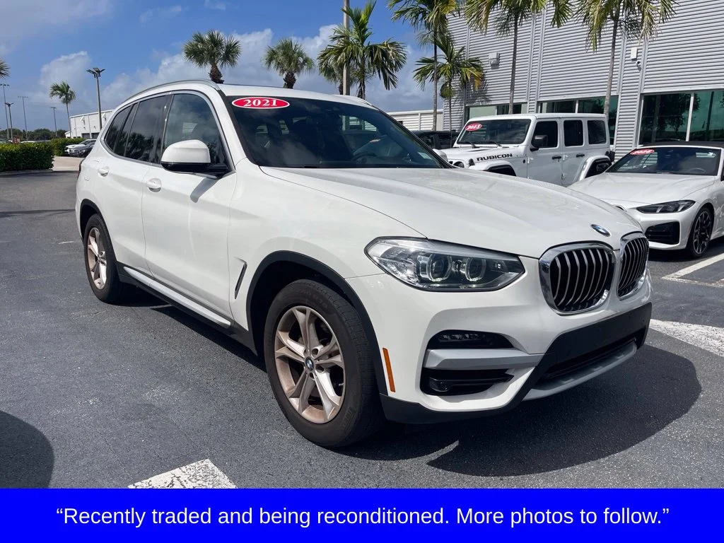 Used 2021 White BMW xDrive30i image 1