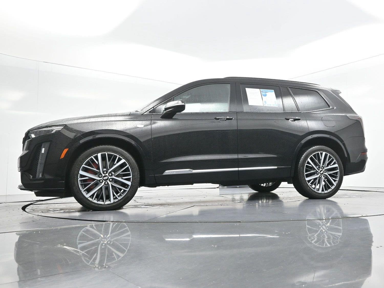 Used 2024 Stellar Black Metallic Cadillac Sport image 54