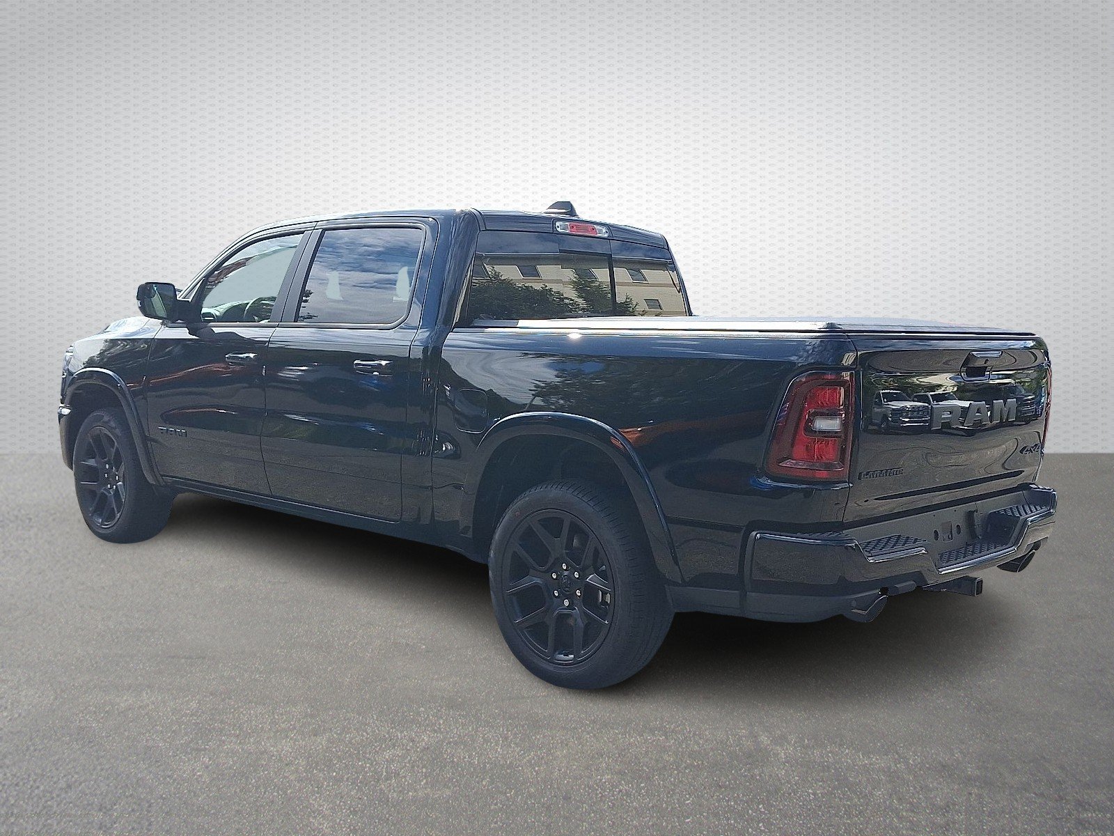 New 2026 Diamond Black Crystal Pearl-Coat Exterior Paint RAM Laramie Crew Cab 4x4 5