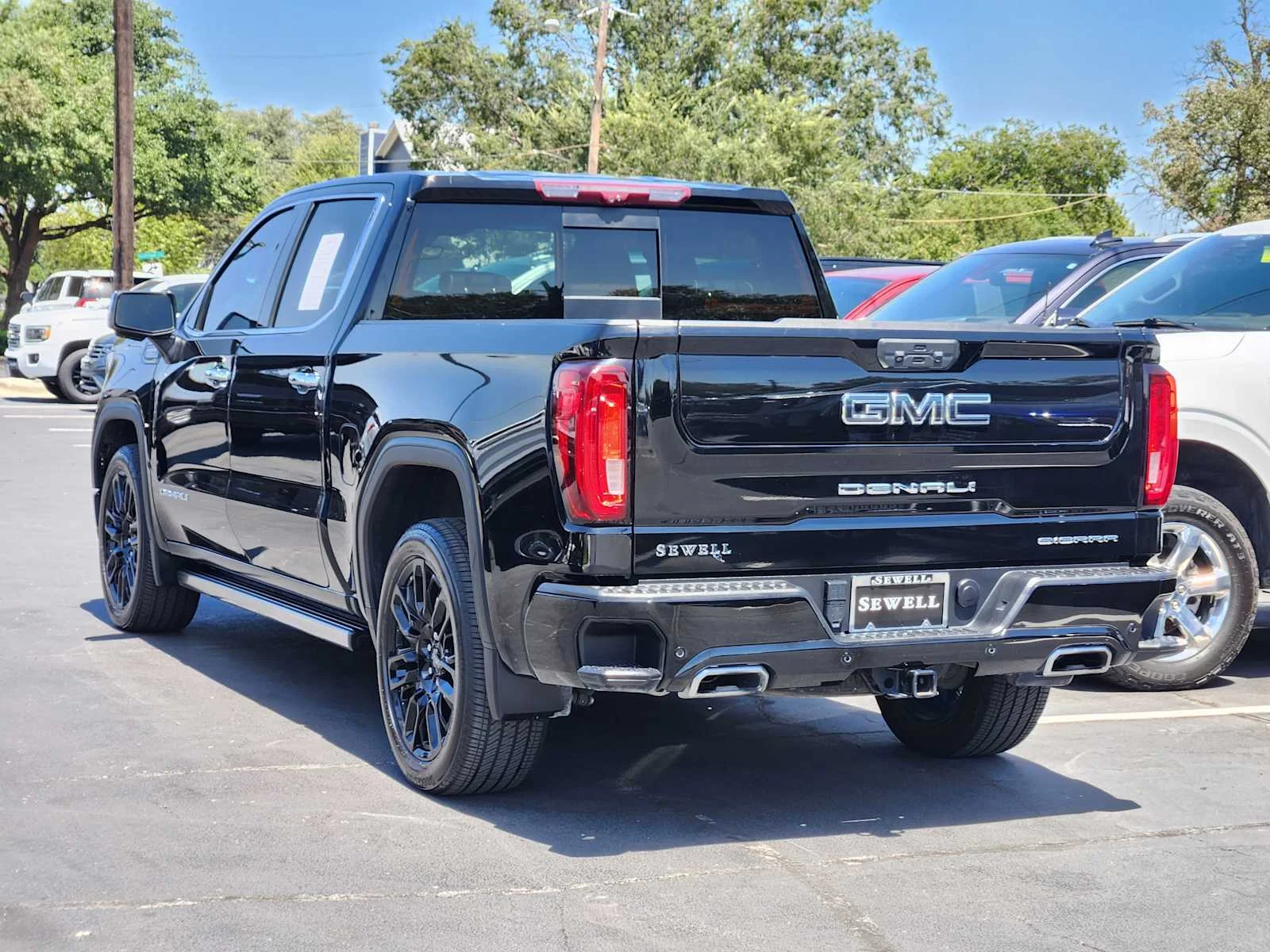 Used 2023 ONYX BLACK GMC Denali Ultimate image 4