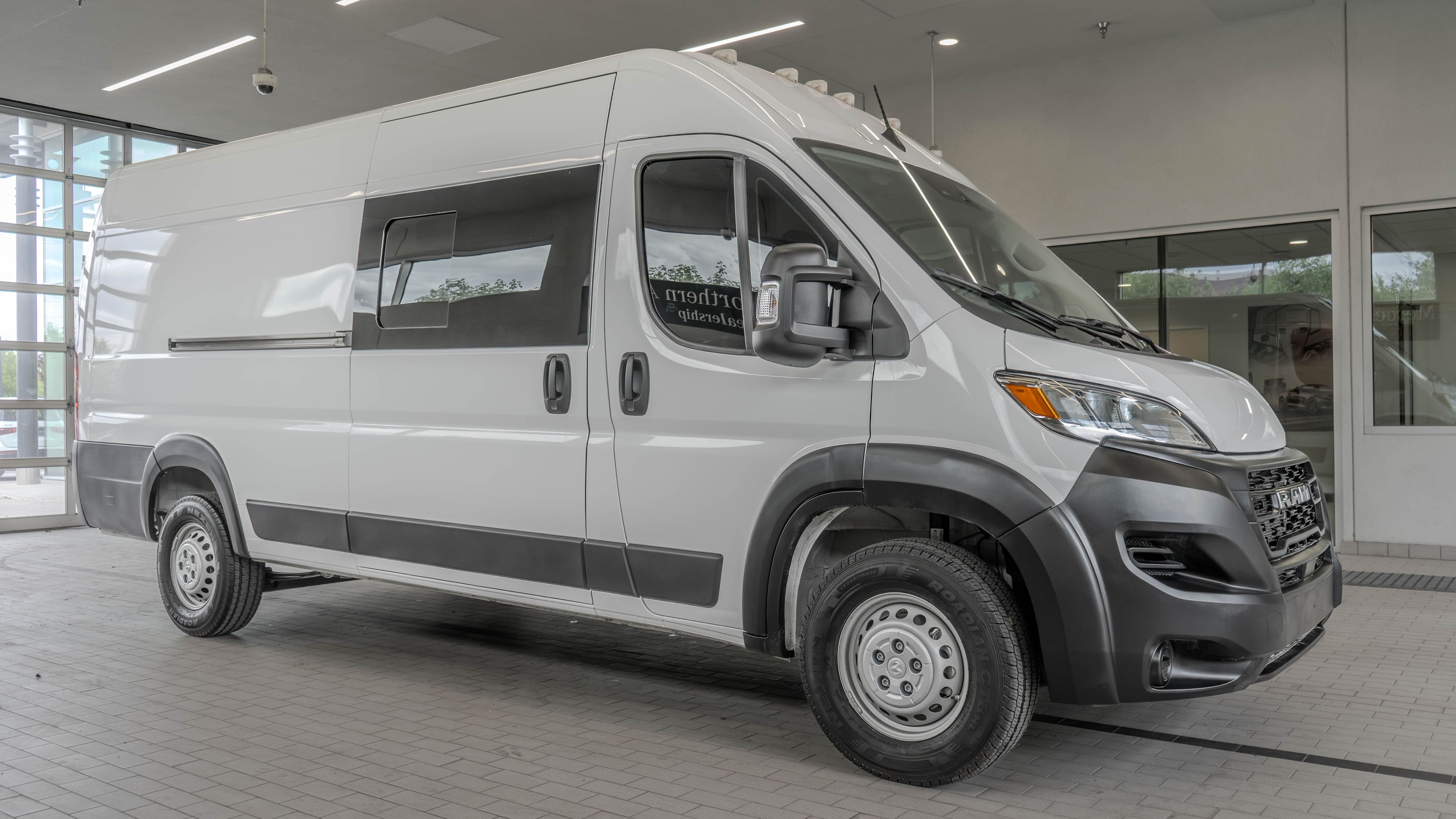 Used 2024 Bright White Clearcoat Ram High Roof image 12