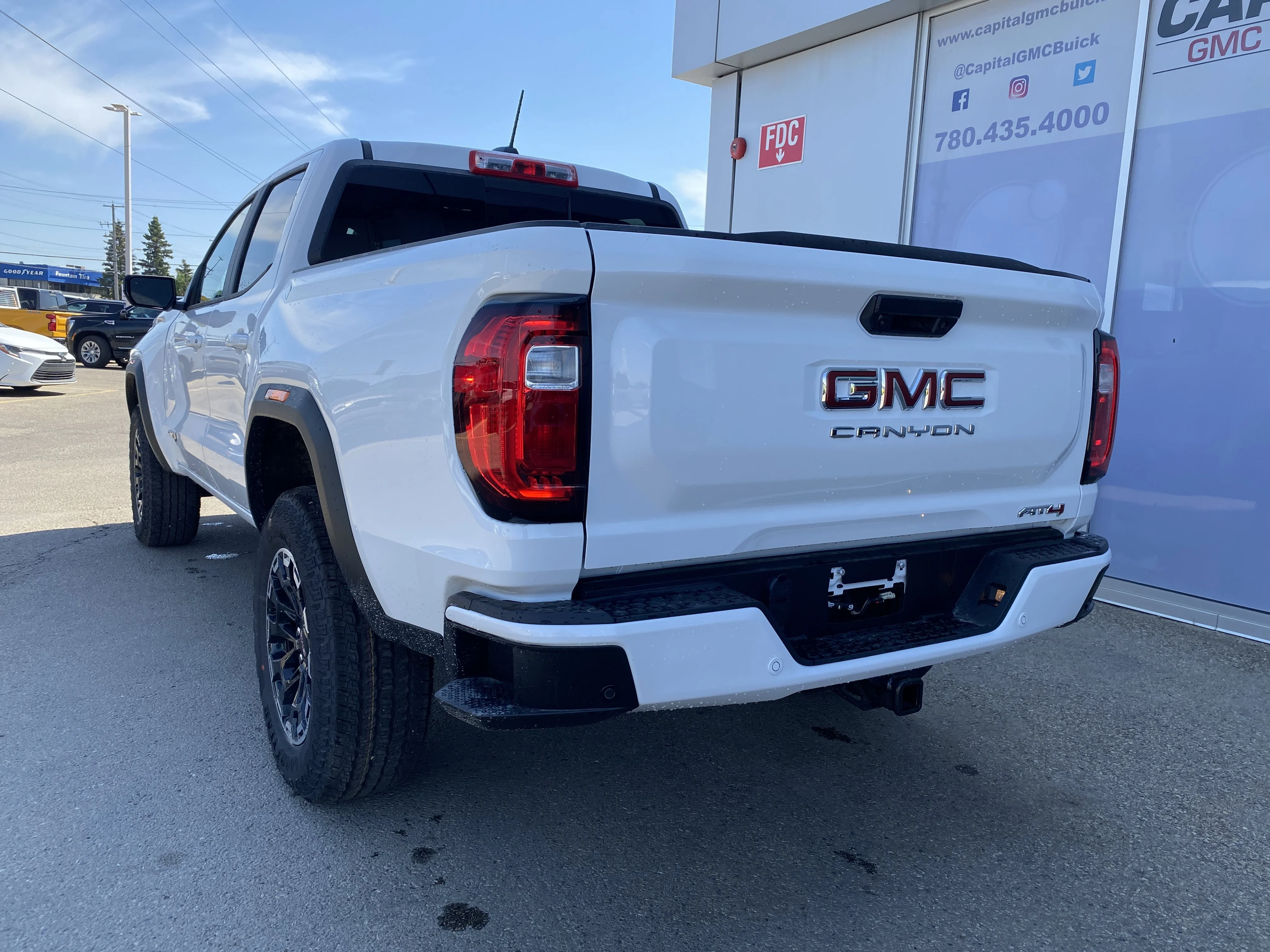 New 2026 Summit White GMC 4WD AT4 image 4