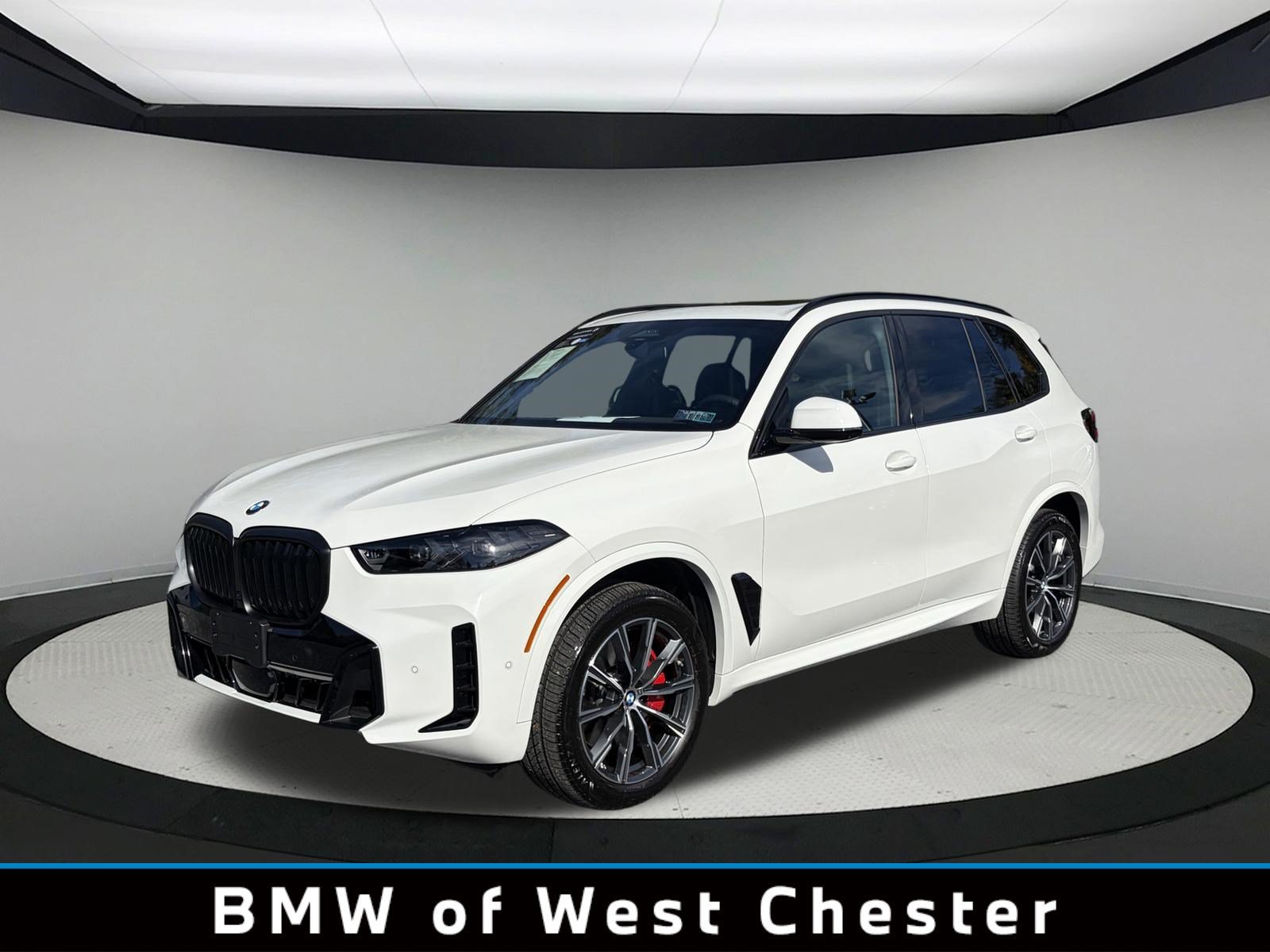 Certified Used 2026 Alpine White BMW xDrive40i image 1