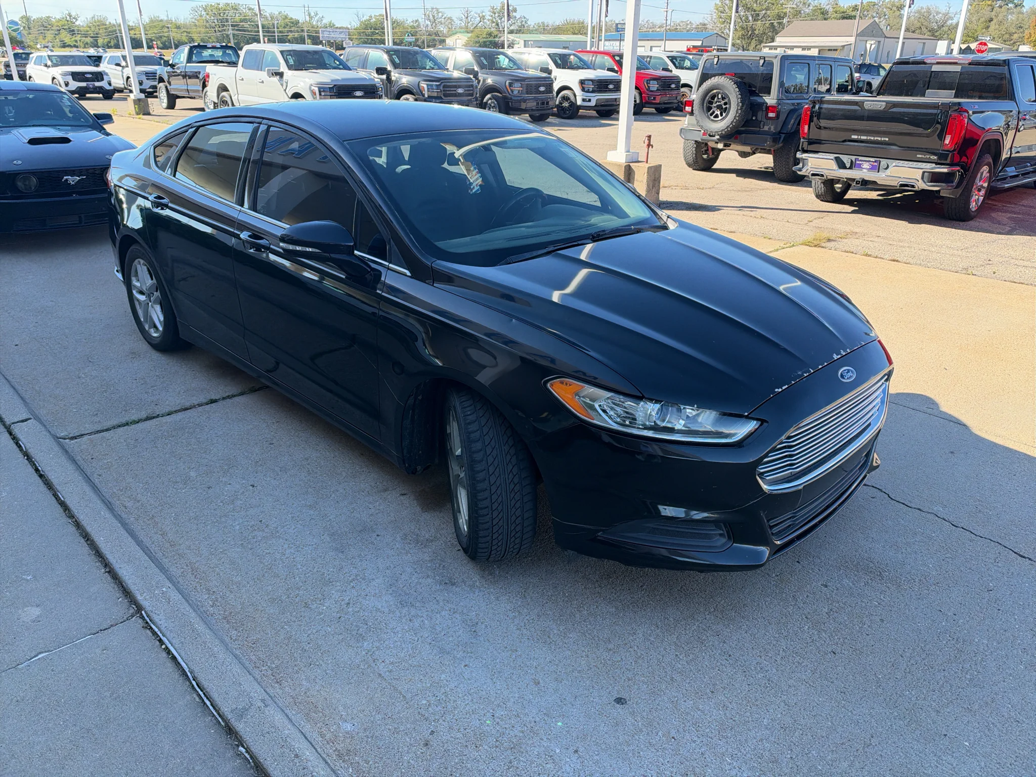 Used 2015 Ruby Red Tinted Clearcoat Ford SE image 4