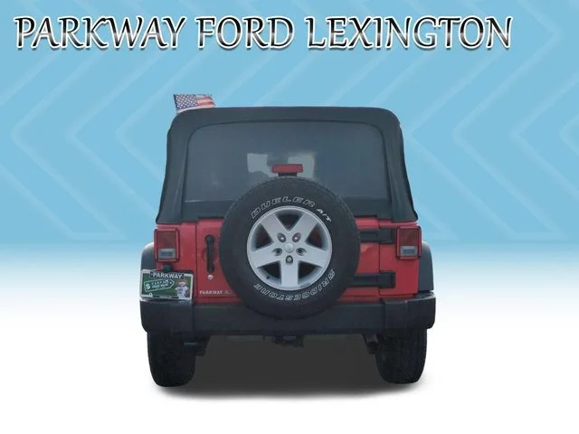 Used 2016 Red Jeep Unlimited Sport image 4