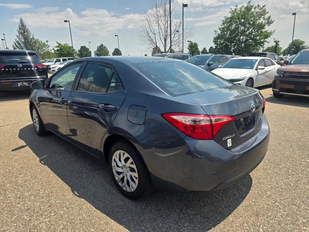 Used 2019 Slate Metallic Toyota LE image 14