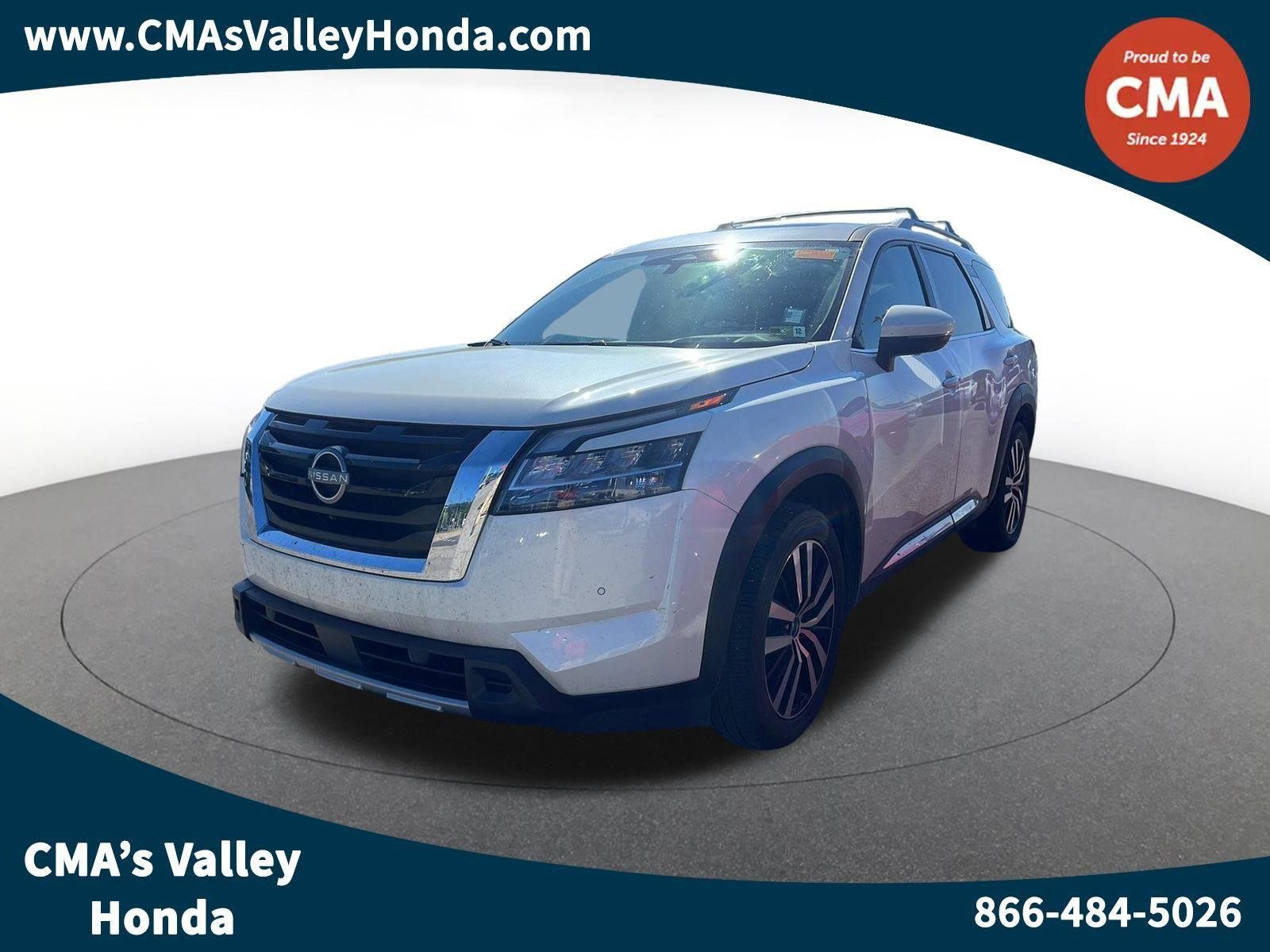 Used 2023 Pearl White Tricoat Nissan Platinum image 1