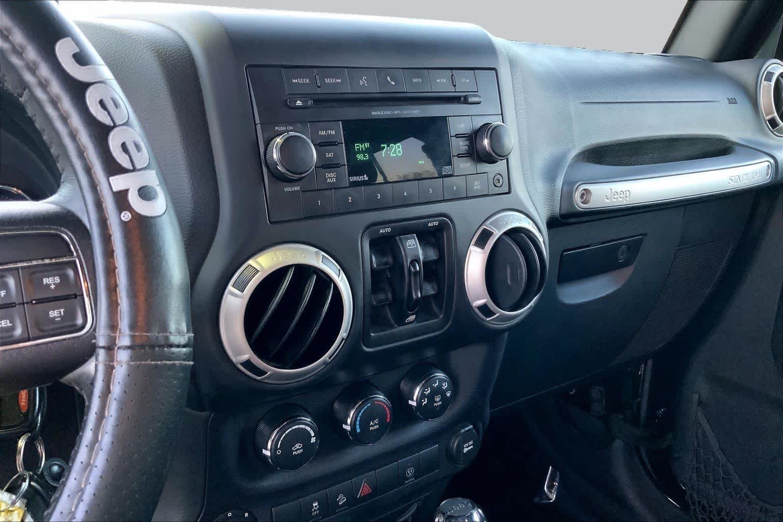 Used 2016 Black Clearcoat Jeep Sahara image 6