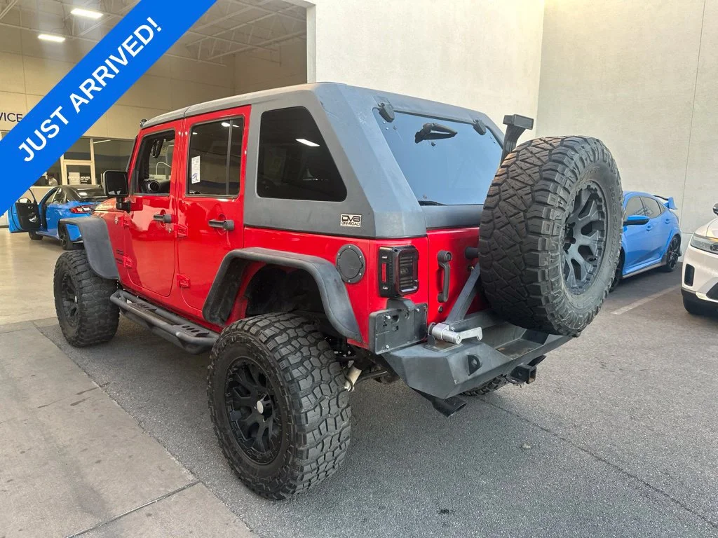 Used 2017 Red Clearcoat Jeep Unlimited Sport image 4