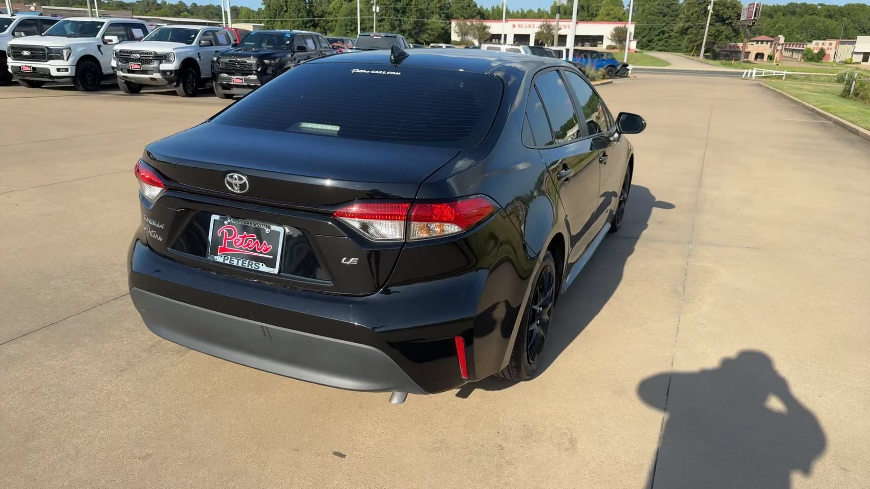 Used 2024 Midnight Black Metallic Toyota LE image 8