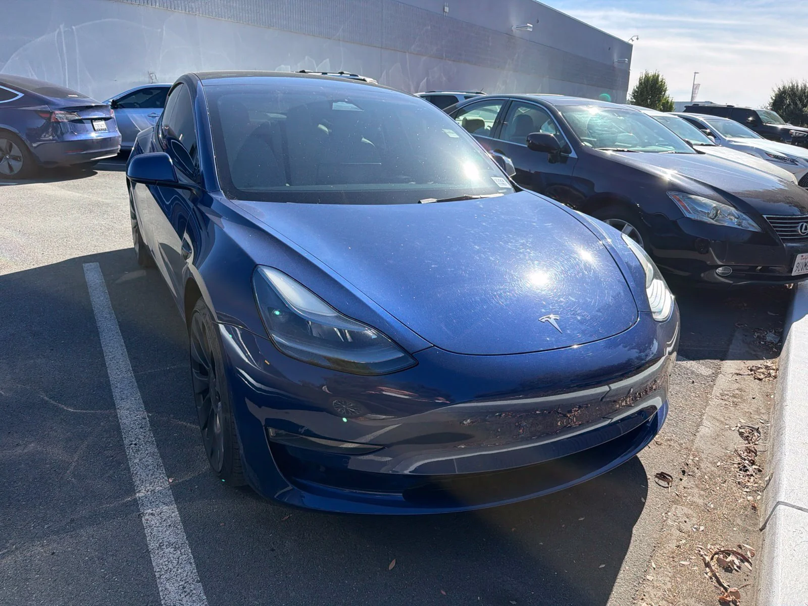 Used 2022 Deep Blue Metallic Tesla Performance image 1