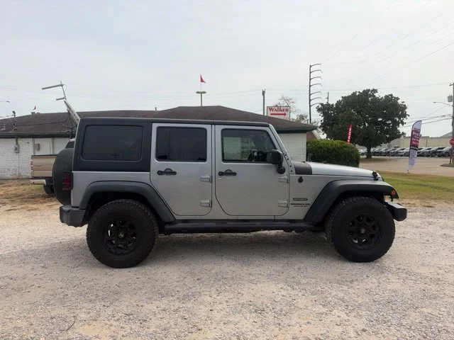Used 2016 Silver Jeep Unlimited Sport image 16