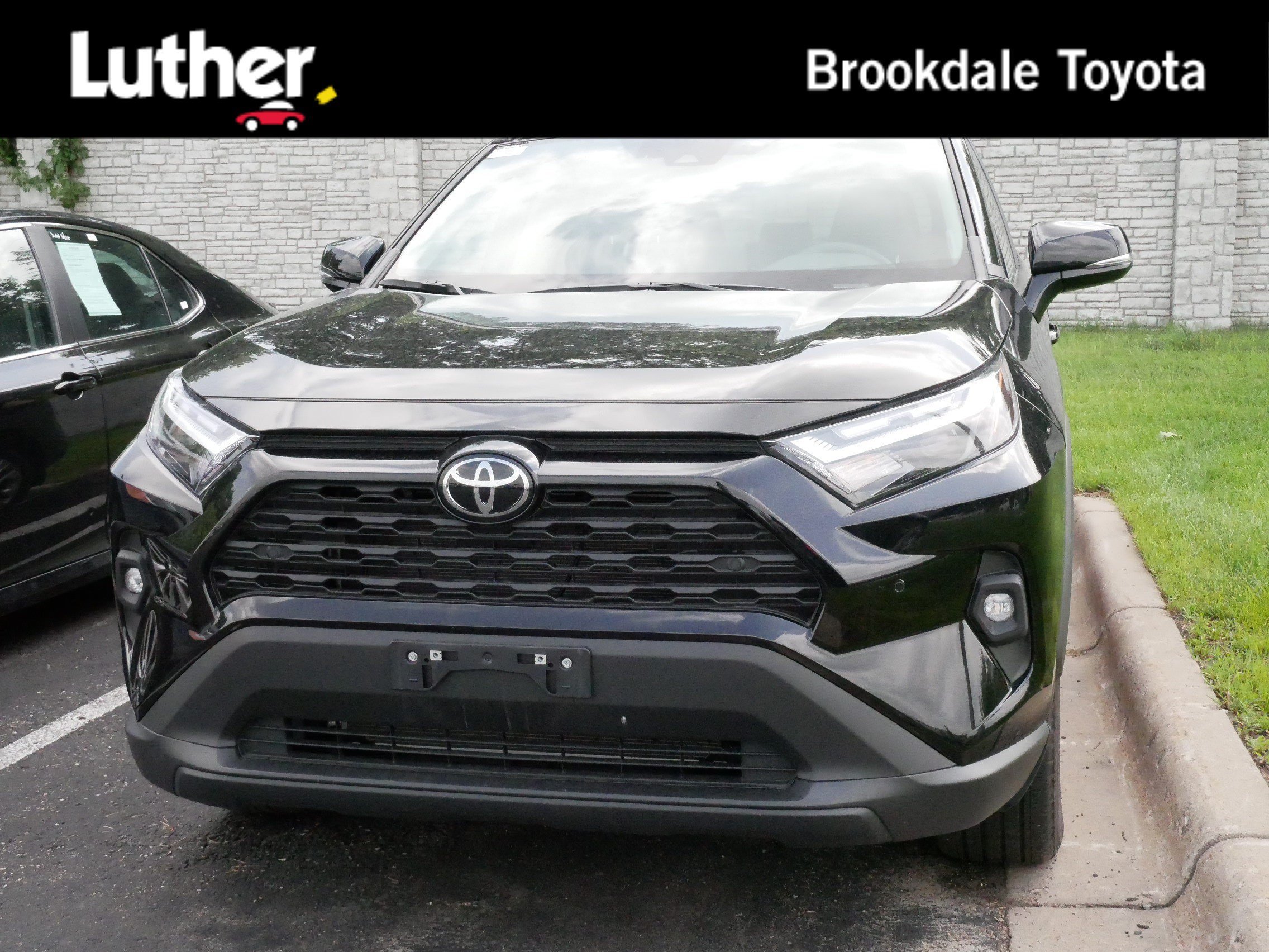 Used 2025 Midnight Black Metallic Toyota XLE Premium image 1