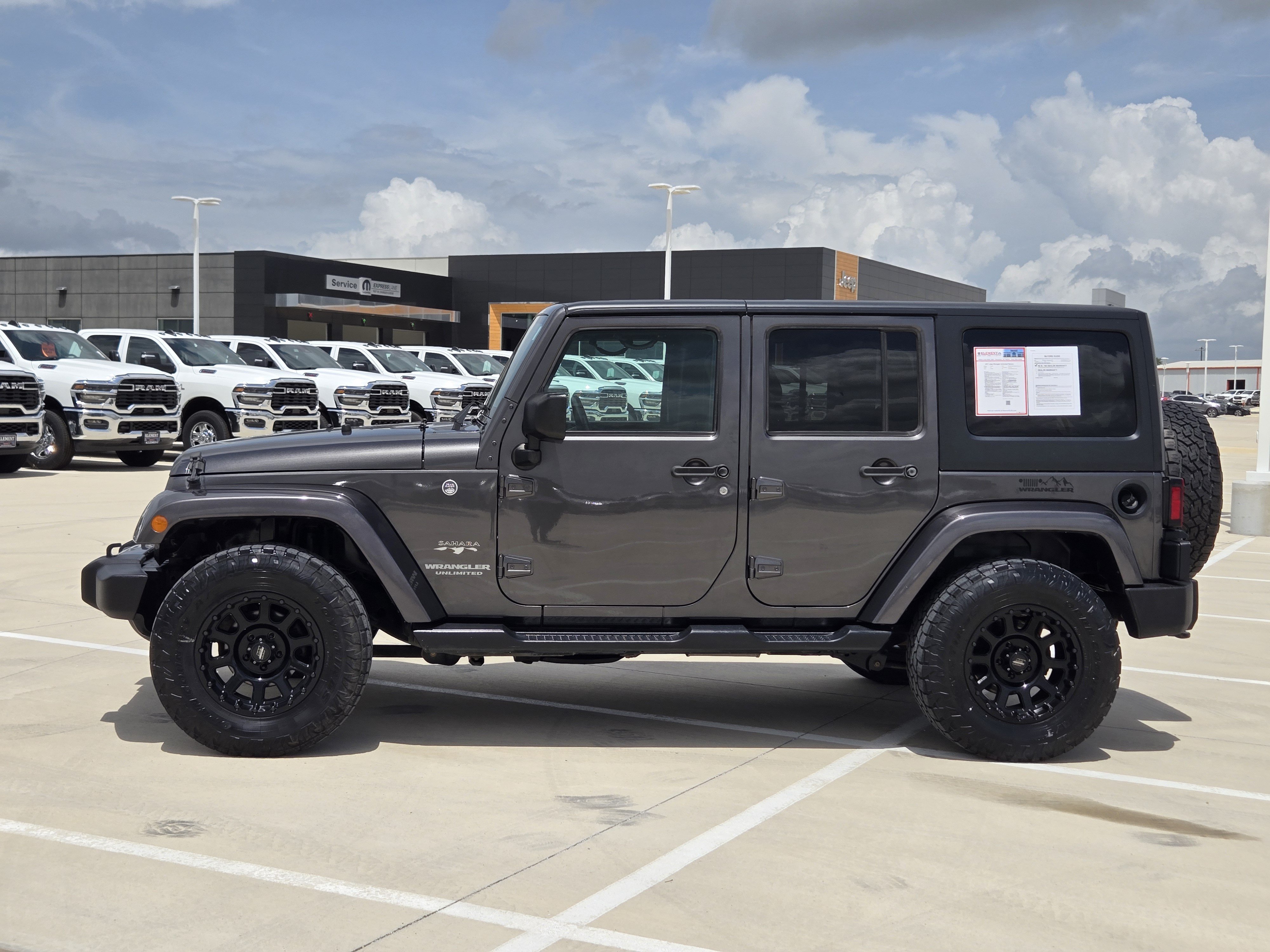 Used 2017 Granite Crystal Metallic Clearcoat Jeep Sahara image 5
