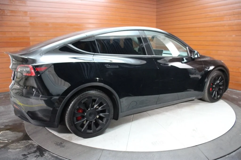 Used 2022 Solid Black Tesla Performance image 10