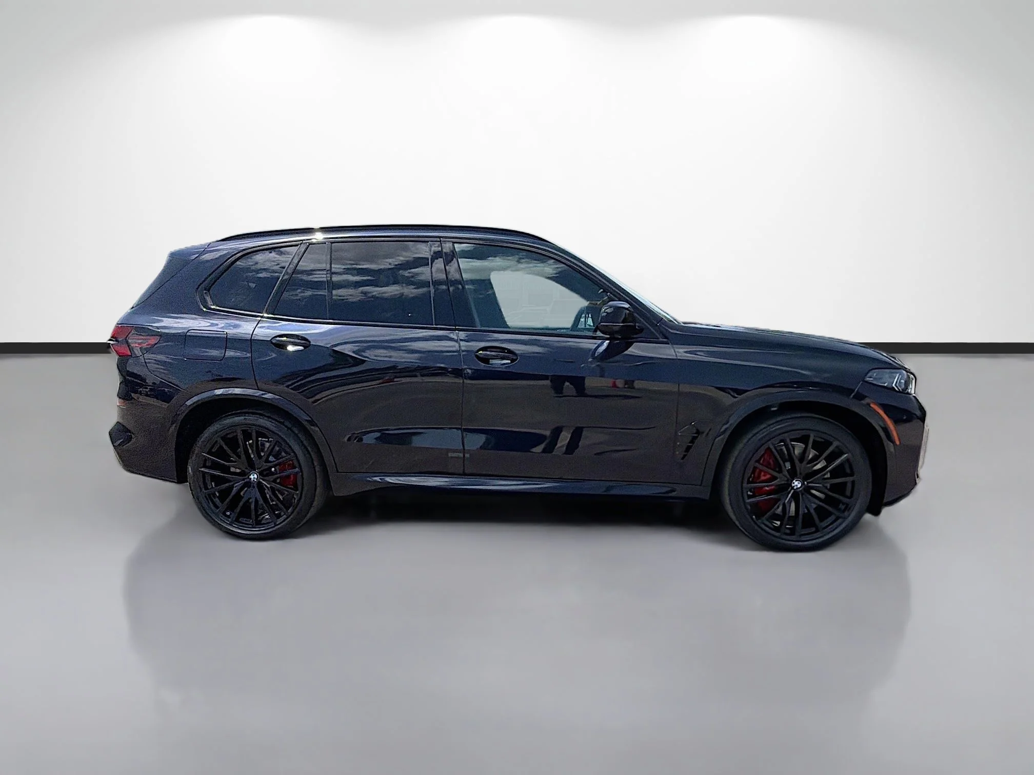 New 2026 Carbon Black Metallic BMW M60i image 2