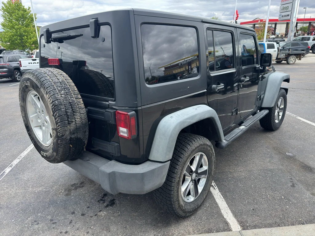 Used 2011 Black Clearcoat Jeep Sport image 5