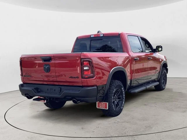 New 2026 Molten Red Ram REBEL CREW CAB 4X4 5