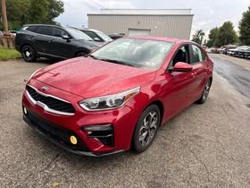 Used 2020 Currant Red Kia LXS image 1