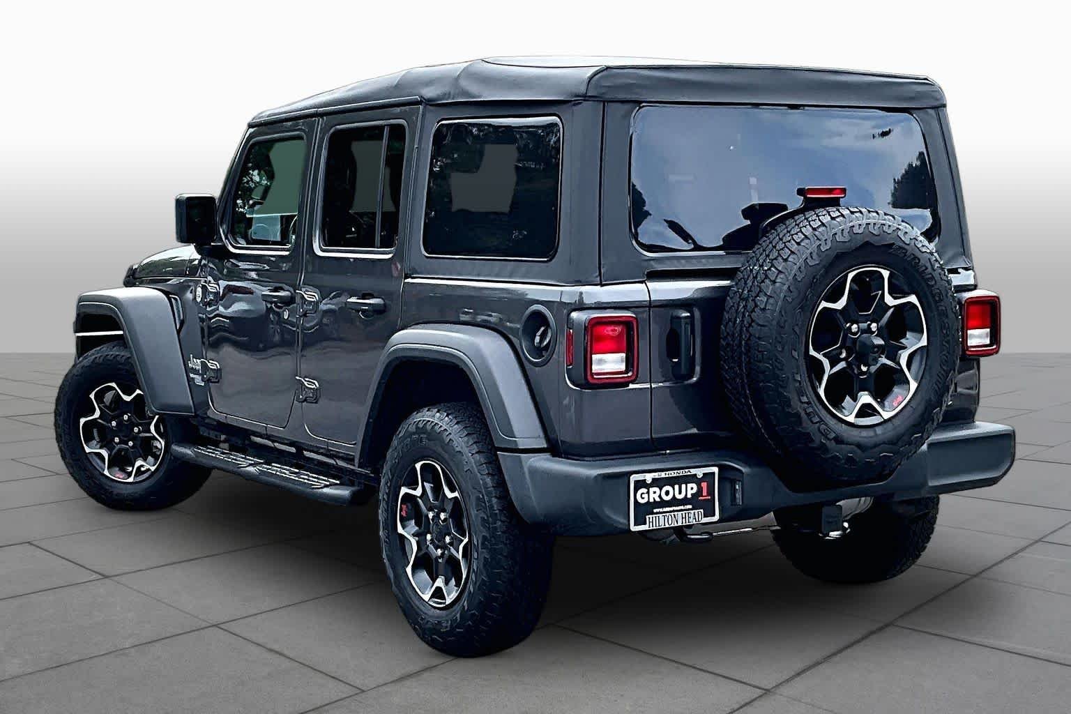 Used 2021 Granite Crystal Metallic Clearcoat Jeep Unlimited Sport S image 11