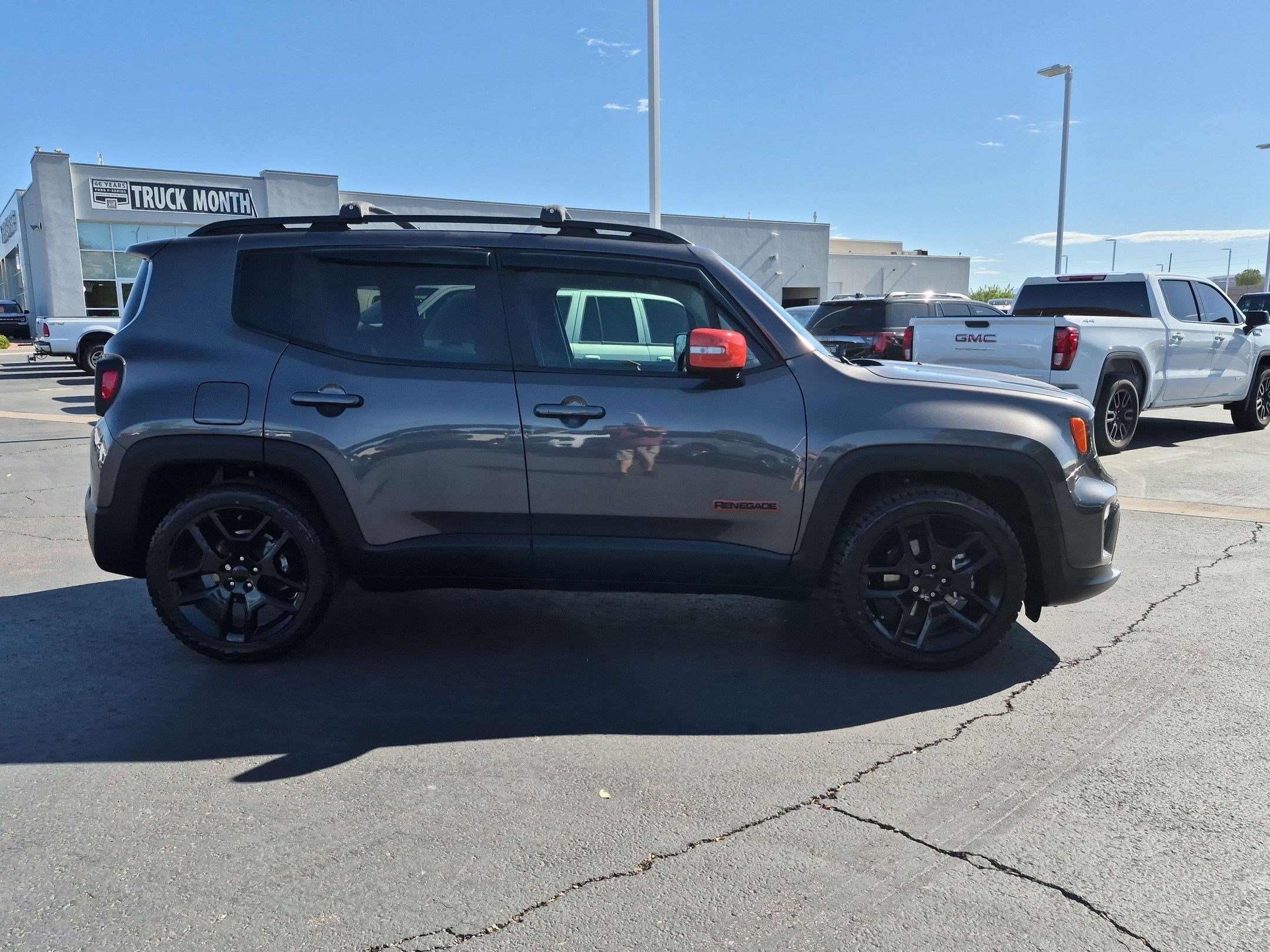 Used 2020 Granite Crystal Clearcoat Metallic Jeep Orange Edition image 2