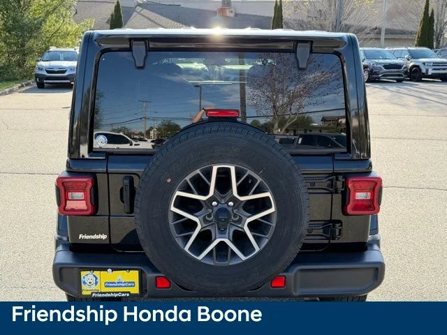 Used 2024 Black Jeep Sahara image 6