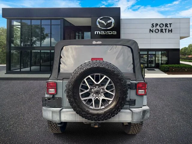 Used 2015 Gray Jeep Unlimited Sport image 4