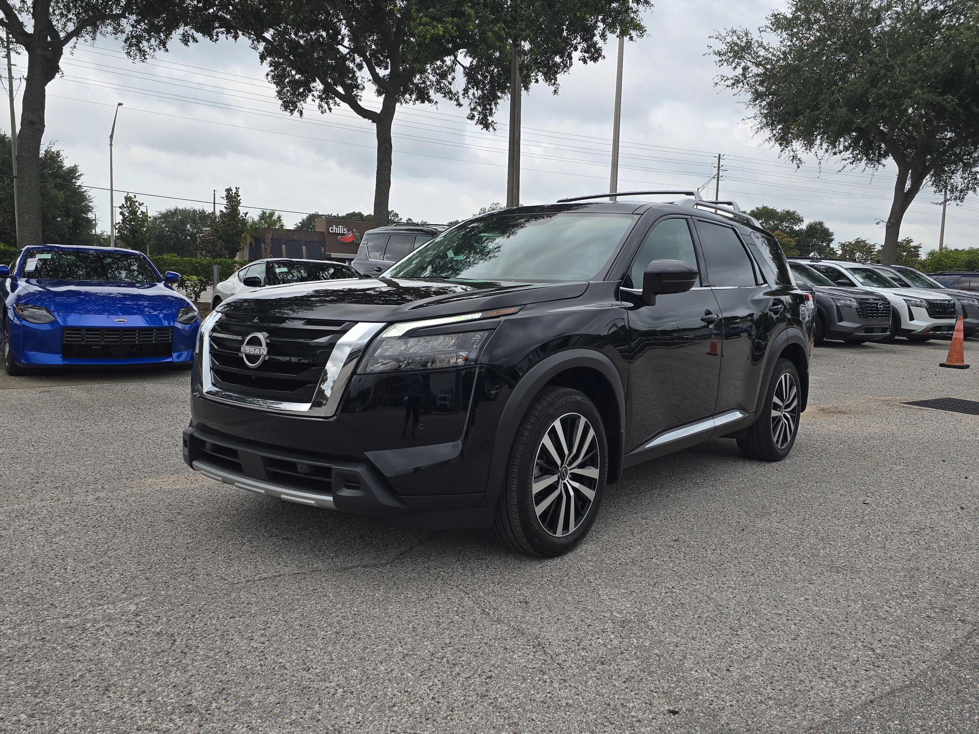 Certified Used 2025 Super Black Nissan Platinum image 4