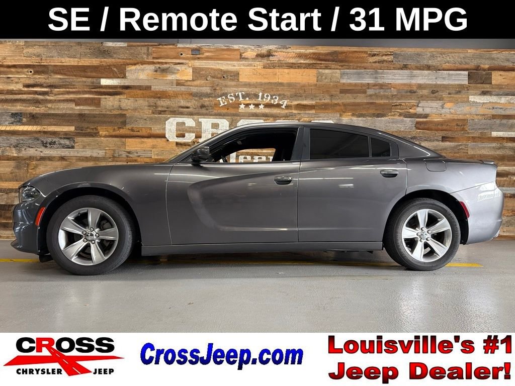 Used 2015 Crystal Metallic Dodge SE image 1