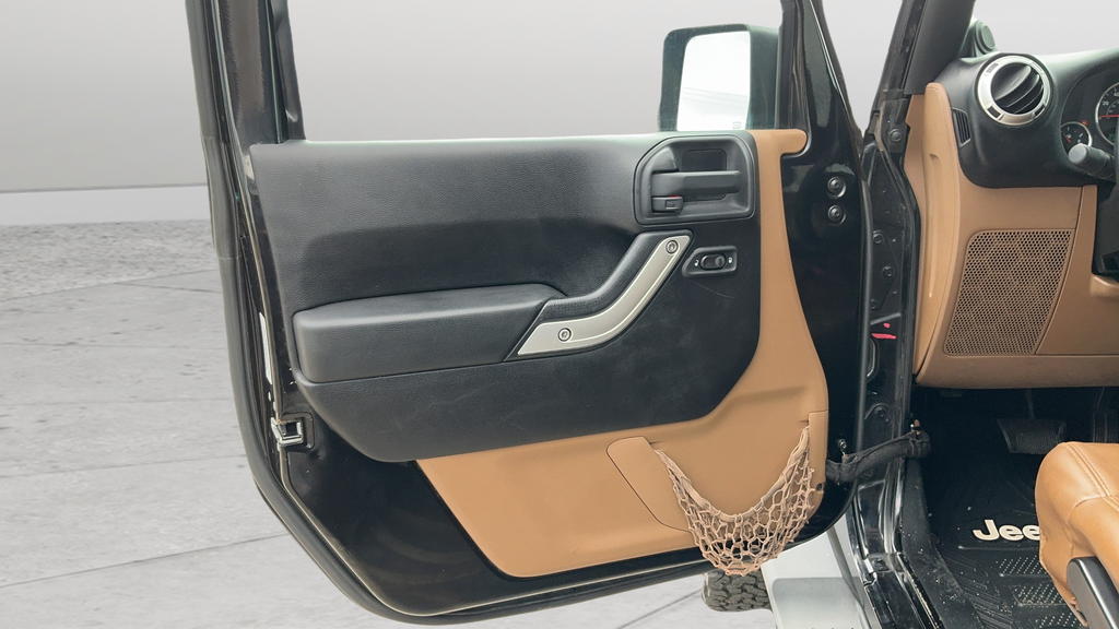 Used 2012 Black Clearcoat Jeep Unlimited Sahara image 17
