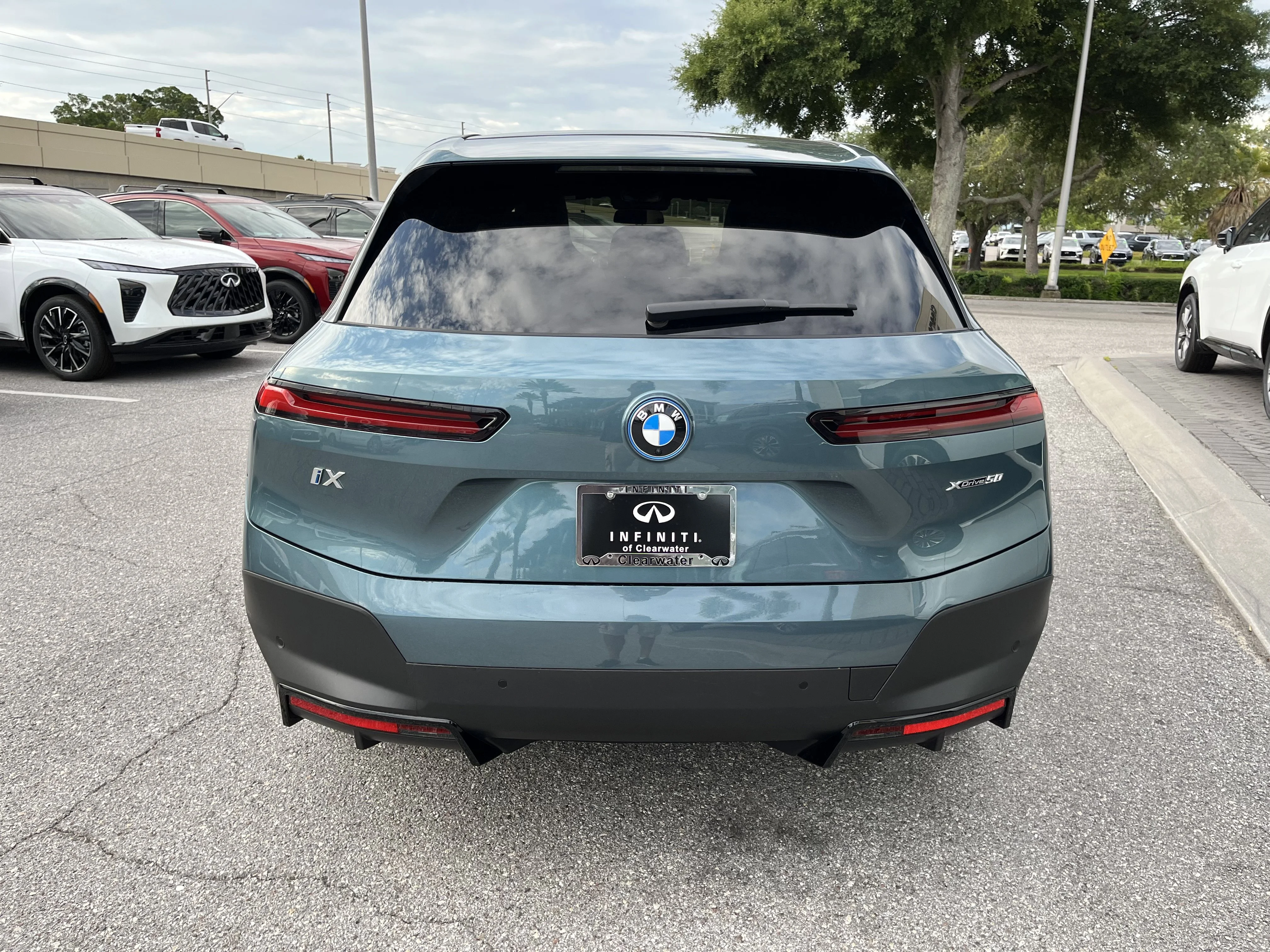 Used 2025 Blue Ridge Mountain Metallic BMW xDrive50 image 8