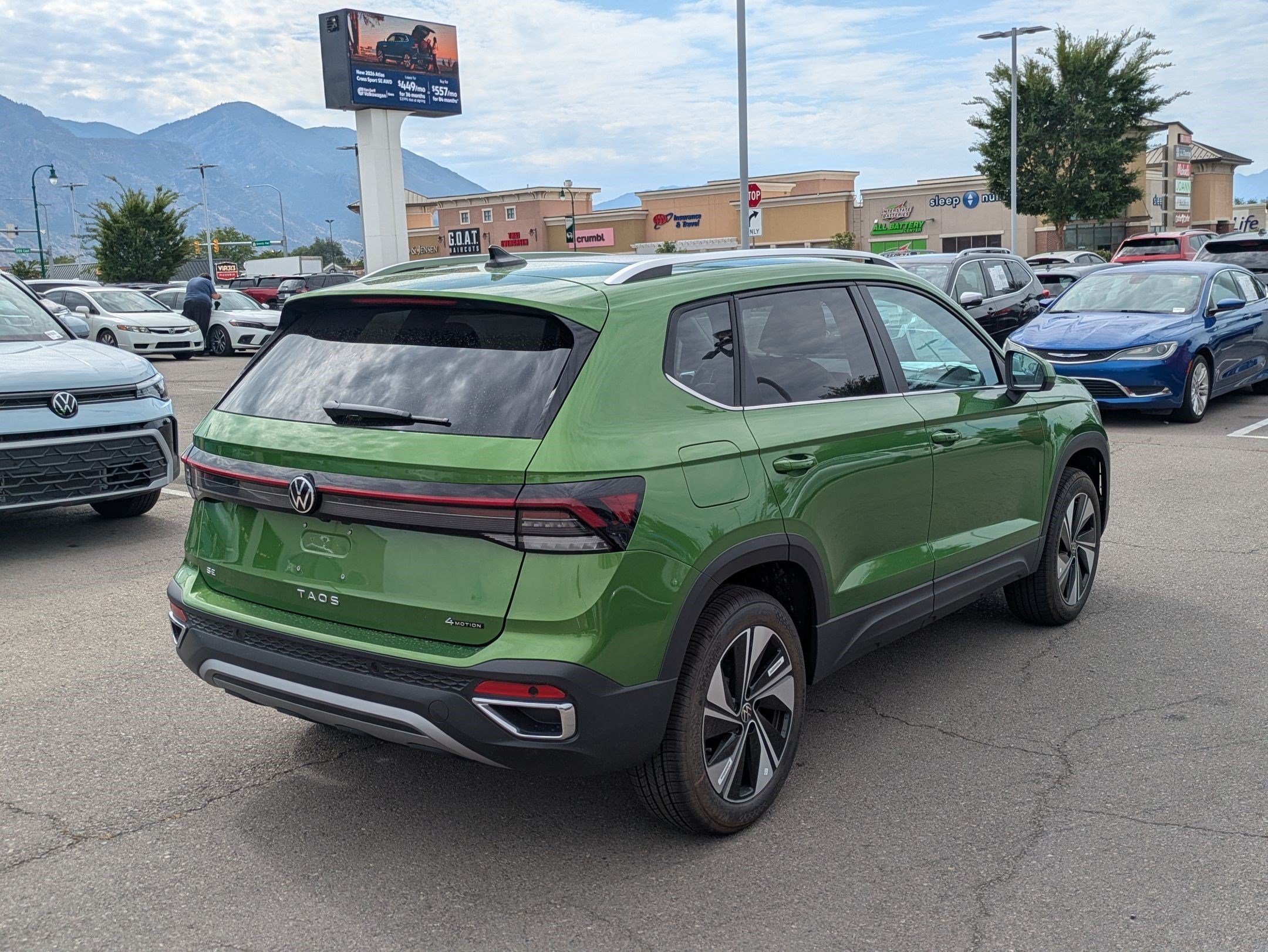 New 2026 Bright Moss Green Metallic Volkswagen SE image 3