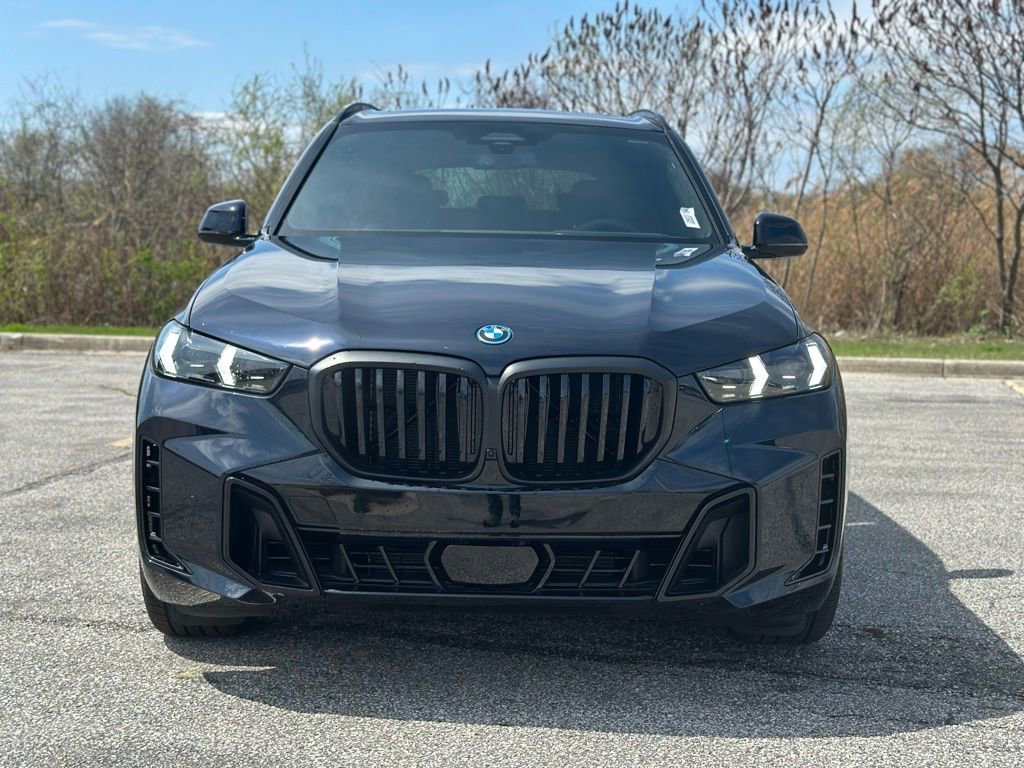 New 2026 Carbon Black Metallic BMW xDrive50e image 2